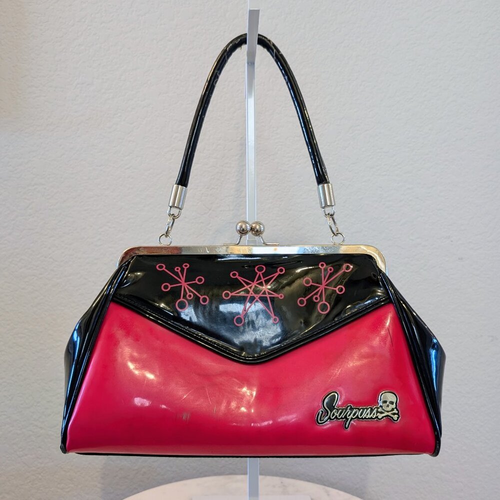 Sourpuss Sputnik Backseat Baby Handbag | Pink/Red and Black Rockabilly Frame Bag